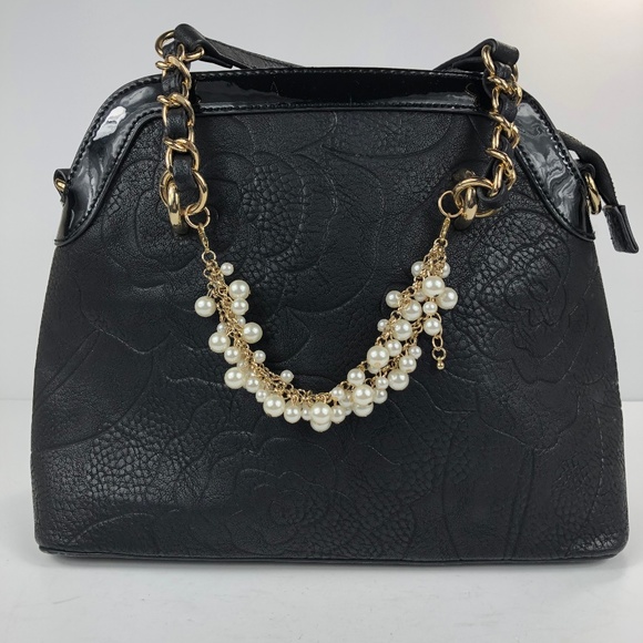 Charming Charlie Handbags - Charming Charlie Black Floral Embossed Purse